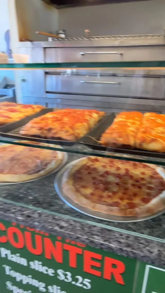 Pies and slices in Anthony’s pizza counter